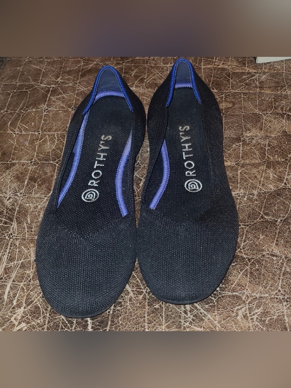Rothy's Black Knit Flats with blue Trim ( fit like a 7)